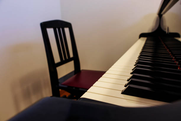 istock Piano and chair 1267300995