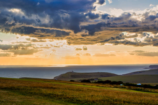 Cliff top at Beachy Head with path and Belle Tout lighthouse