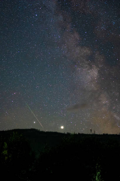 istock Falling star over the mountains of the Alps 1267301404