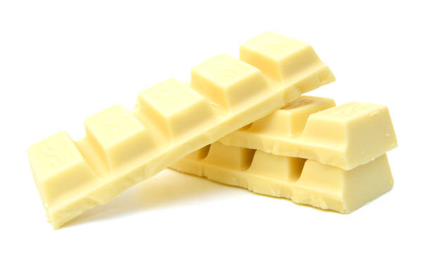 istock white chocolate pieces isolated on a white background 1267305239