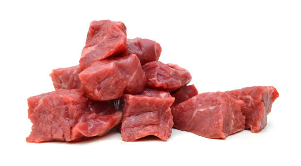 Raw beef meat isolated on white Raw beef meat isolated on white fresh cilantro stock pictures, royalty-free photos & images