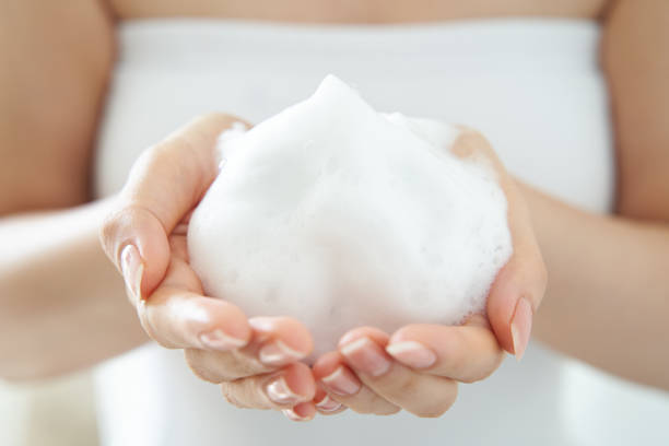 Japanese woman making cleansing foam.