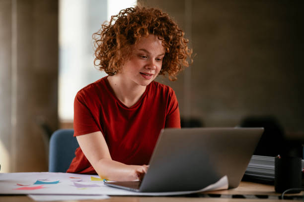 istock Beautiful businesswoman working on projects. 1267306301