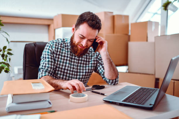 istock Delivery Office Worker Contacting Customer On Smartphone 1267307670