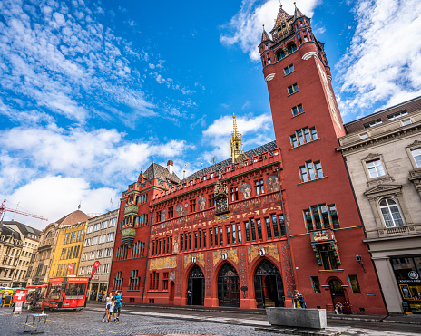 Basel Switzerland , 29 June 2020 : Wide angle view of Basel red Rathaus or town hall an iconic building of Basel old town Switzerland