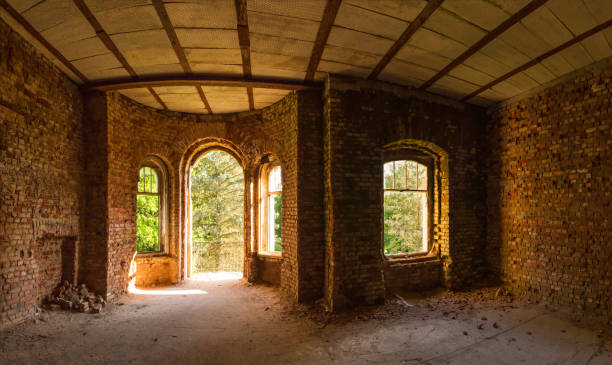 istock Brick wall with windows of an old manor house 1267308165