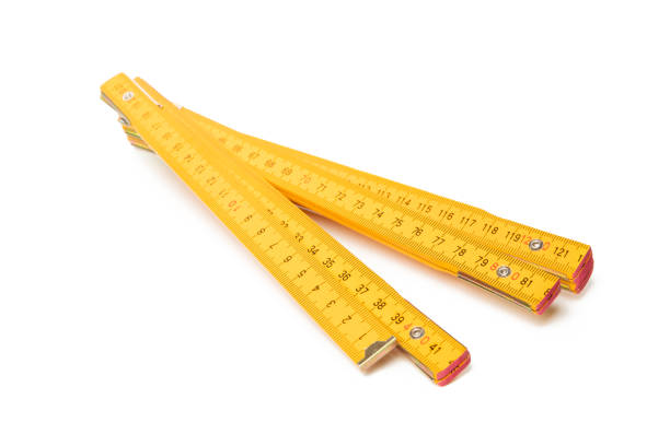 istock Yellow construction tape isolated on white background 1267309351
