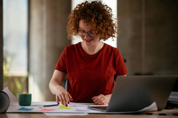 istock Beautiful businesswoman working on projects. 1267309505