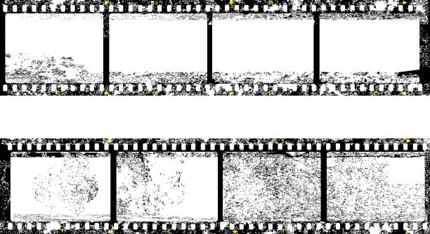 istock grungy film strip, blank photo frames, free copy space fictional artwork 1267311512