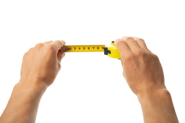 istock Male hands hold construction tape, isolated on white background 1267312353