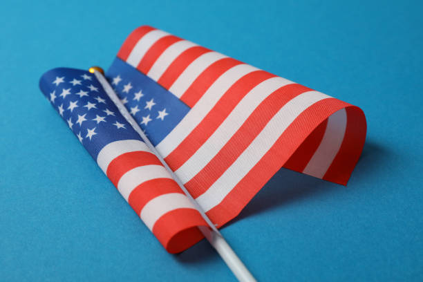 istock American flag on blue background, close up 1267314279