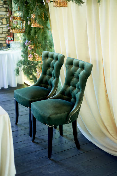 istock Two green chairs lined with green velvet.Gorgeous, palace style 1267314352