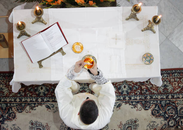 consecration on the altar. - consecrated imagens e fotografias de stock