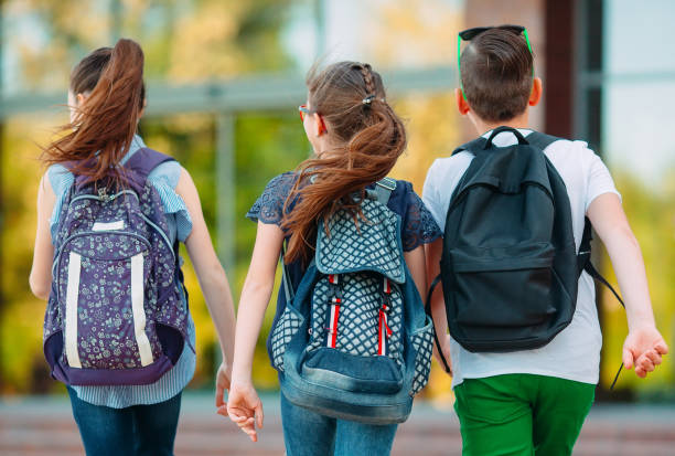 istock Group of kids going to school together. 1267321157
