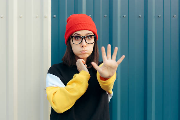 istock Unhappy Young Woman Making Stop Gesture with Hand 1267321853