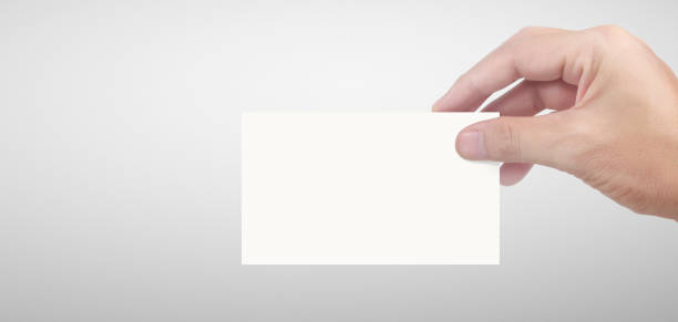 istock Hand holding business card mockup 1267322034