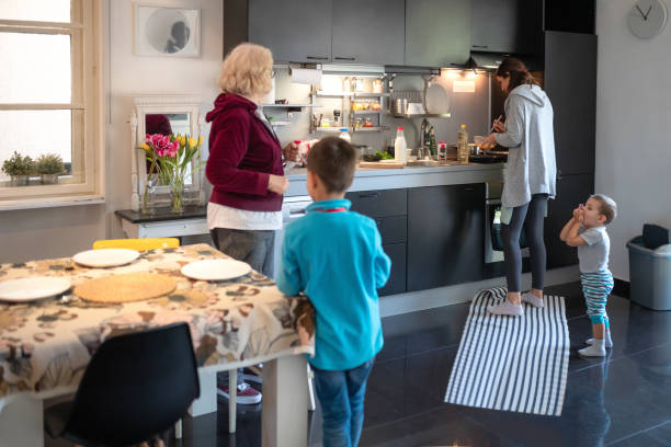 istock Three-generation family in the kitchen 1267324968
