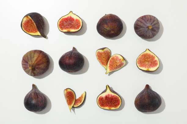 istock Flat lay with fig fruits on white background 1267325147