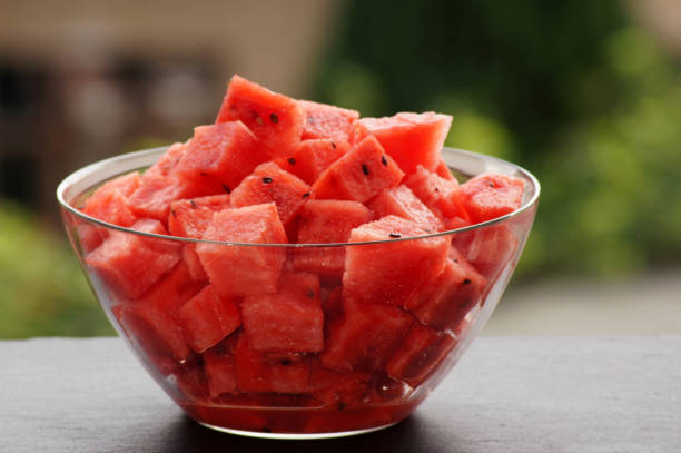 istock Close-up of melon pieces on green background 1267325257