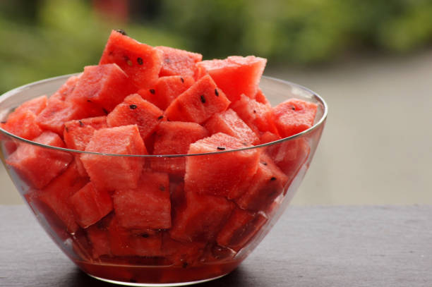 istock Close-up of melon pieces on green background 1267325269