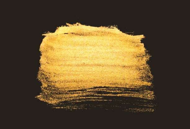 istock Abstract golden watercolor stain on black background 1267326577