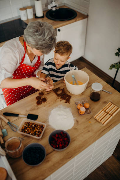 Grandma and grandchild bake cake