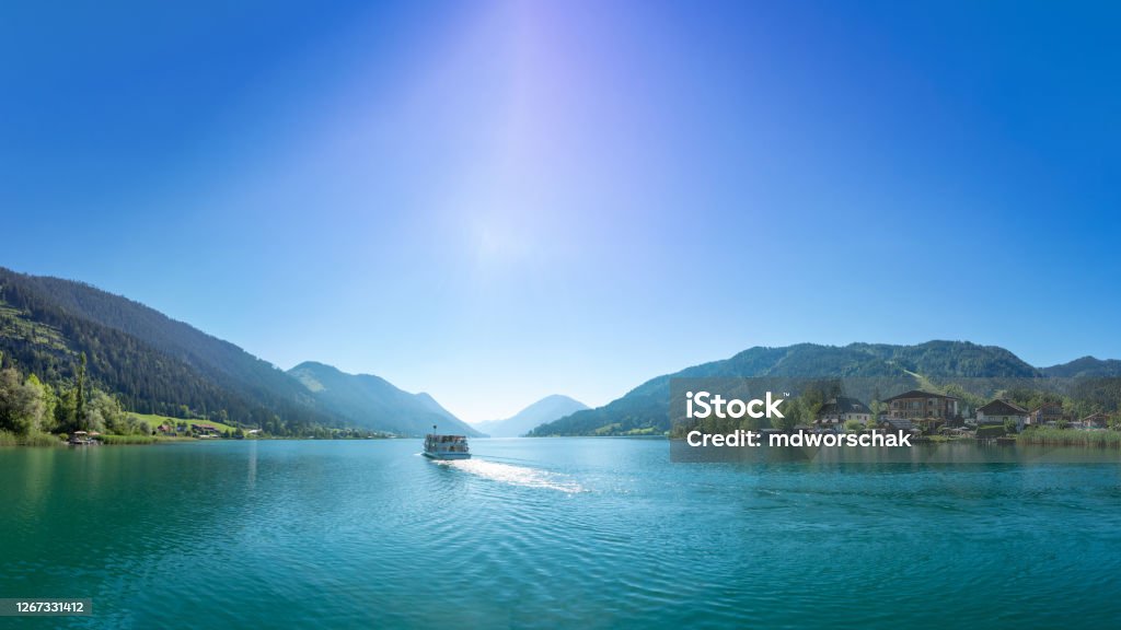 Weissensee in Carinthia. Famous lake in the South of Austria. Weissensee in the Kärnten region. View to the famous lake in the South of Austria during summer. Carinthia Stock Photo