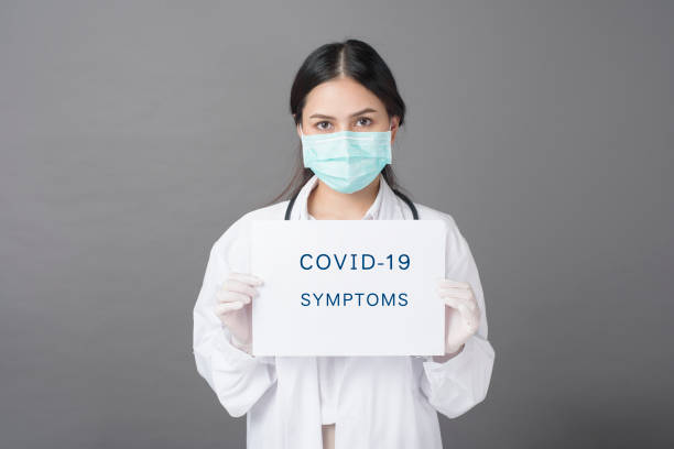 istock Doctor is holding Coronavirus paper 1267331500