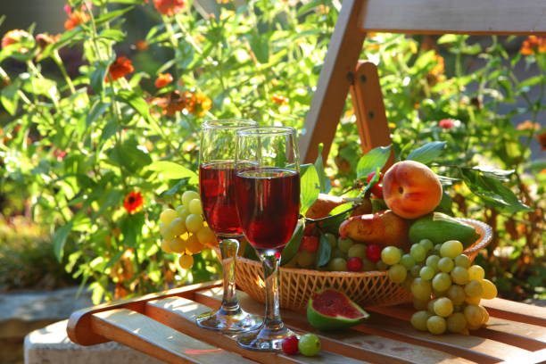 Still life with red wine and fruits