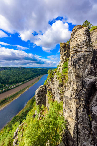 View from the bastei viewpoint of the Elbe river - beautiful landscape scenery of Sandstone mountains in Saxon Switzerland National Park, Germany View from the bastei viewpoint of the Elbe river - beautiful landscape scenery of Sandstone mountains in Saxon Switzerland National Park, Germany elbe valley stock pictures, royalty-free photos & images