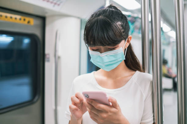 istock woman with mask in metro 1267339267