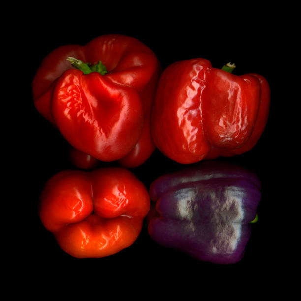istock Four withered bell peppers view from above 1267341057