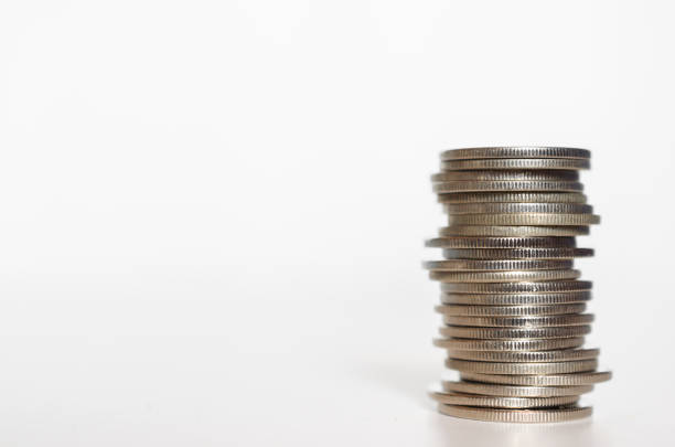 istock silver coin stack growth up isolated on white background with clipping path. money saving, financial grow, business startup, economy budget and investment concept. 1267342773