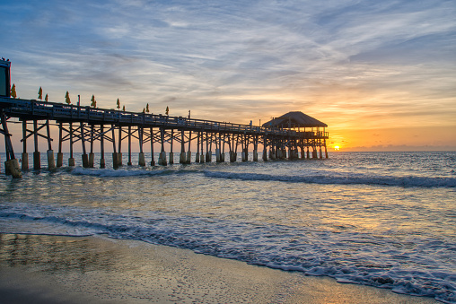 The Cocoa Beach Pier during sunrise at Cocoa Beach in Central Florida USA