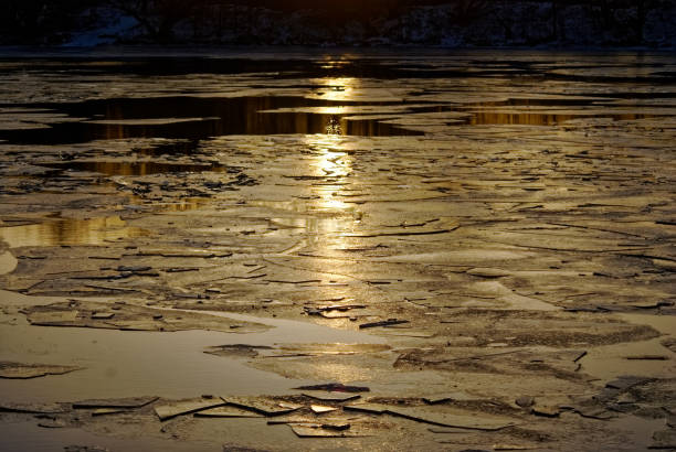 istock ice melts on the river at dawn 1267345297
