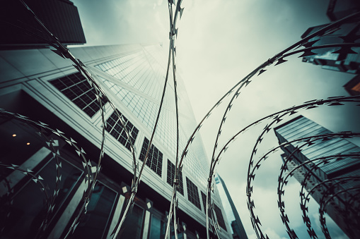 Barbed wire in front of Bank of China Tower