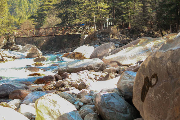 istock Sun kissed Rocks with a stream passing through 1267347825