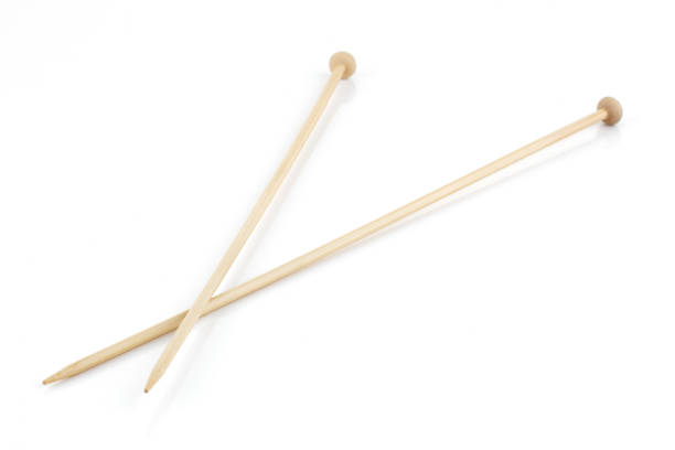 istock A pair of knitting needles isolated on white 1267350053