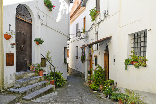 Aieta, italy, 08/03/2020. A narrow street among the old houses of a rural village in the Calabria region.