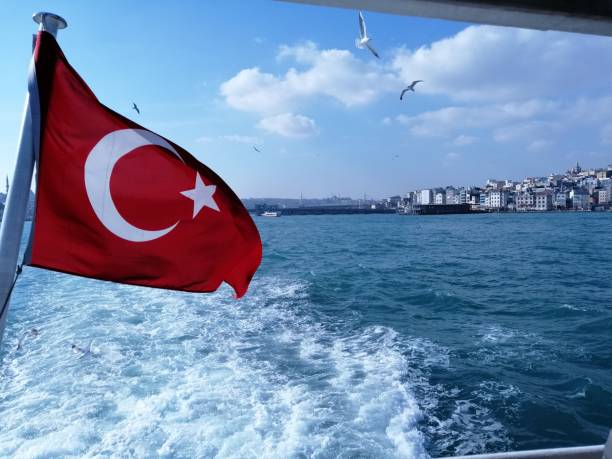 istock Turkish Flag in istanbul bosphorus 1267351591