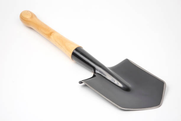 istock small shovel for tourism and earthworks on a white background 1267352776