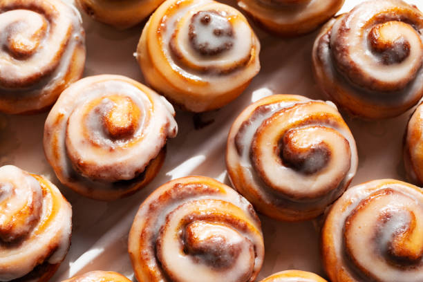 istock Top view of bite size cinnamon swirl rolls in a plastic tray 1267355534