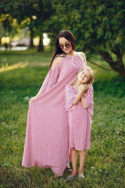 istock Mother with daughter playing in a summer paek 1267363012