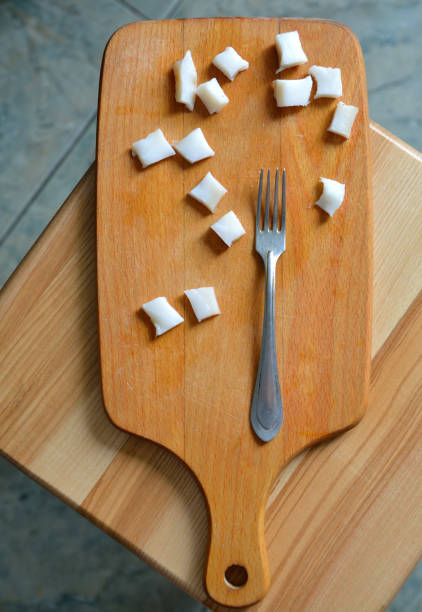 istock lard cut on a wooden board with fork 1267363542