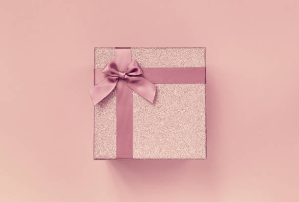 istock Big present box with  bow on a colorful background . Christmas or birthday gift. 1267365896