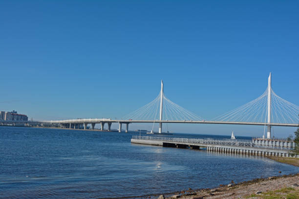 istock Vansu bridge. Across a large river against a bright, clear, blue sky 1267367087