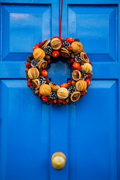 istock Front door with Christmas wreath 1267368020