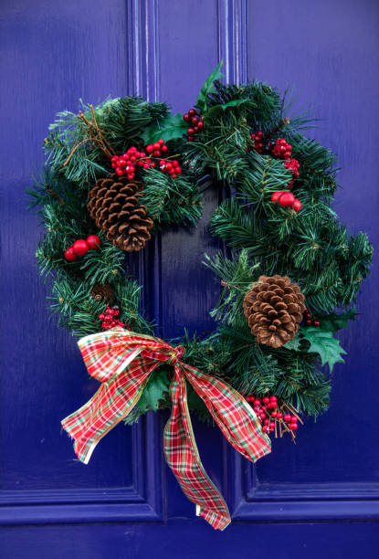 istock Front door with Christmas wreath 1267368158