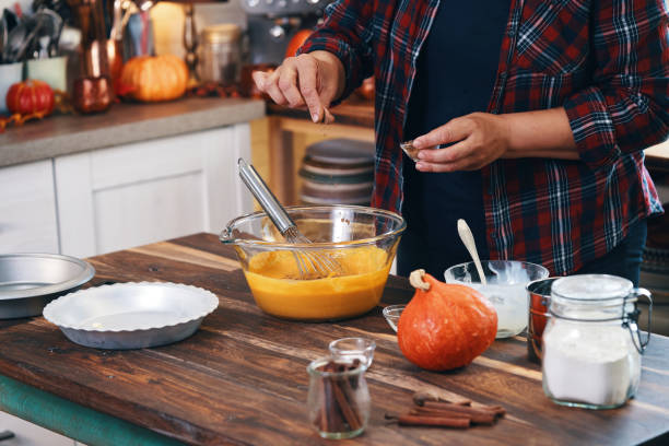 istock Preparing Pumpkin Pie for the Holidays in Domestic Kitchen 1267369420