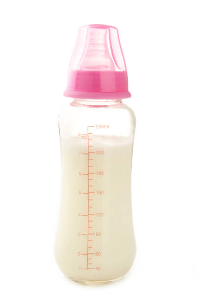 istock Baby milk bottle isolated on white background 1267369429